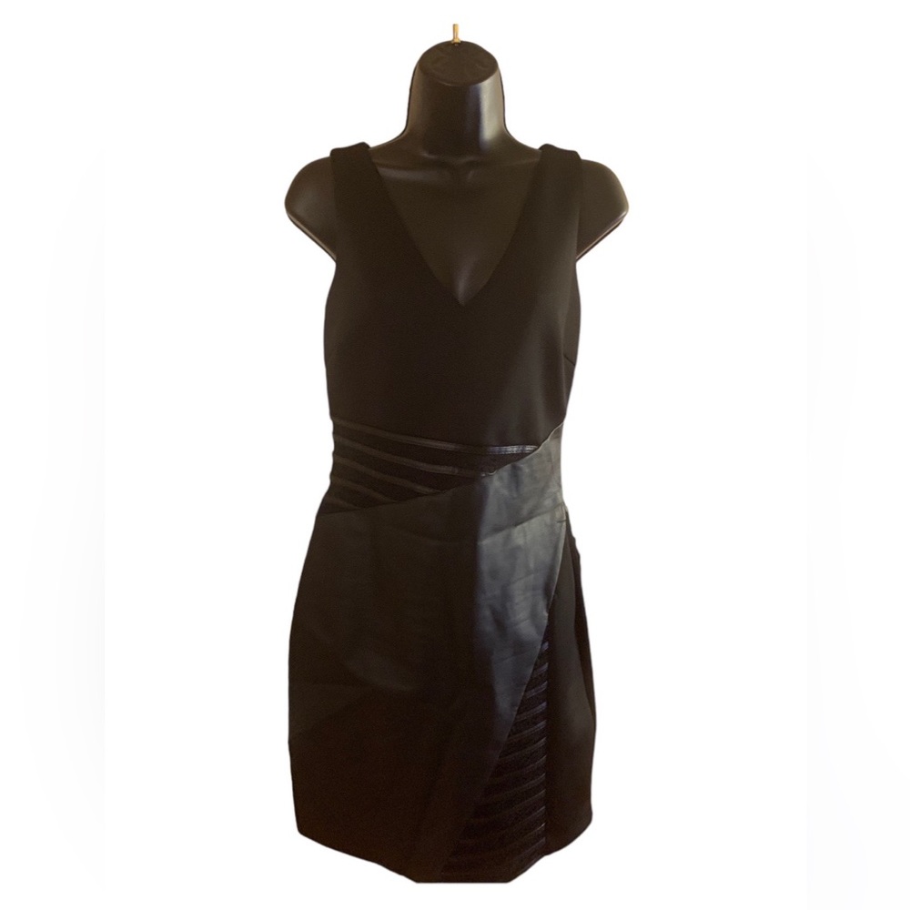 Guess black fitted dress with faux leather accents.